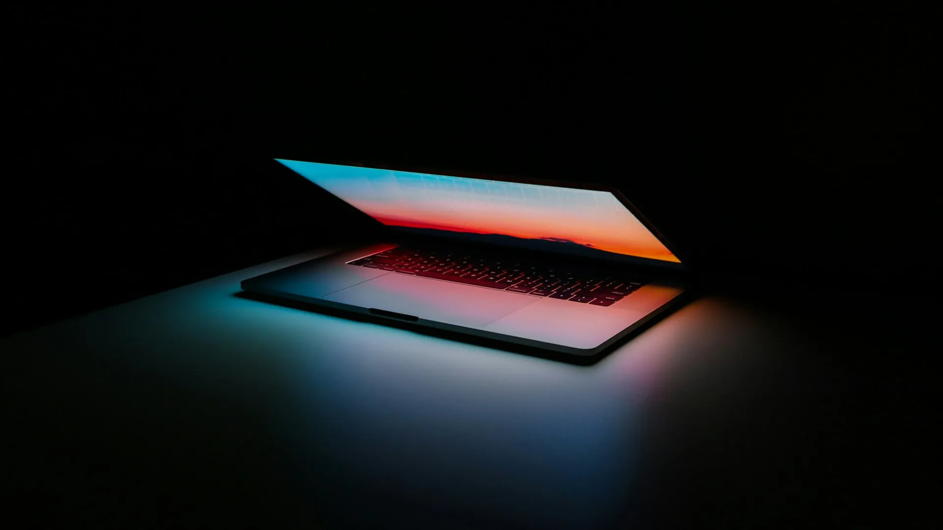 Tech workspace with laptop and devices